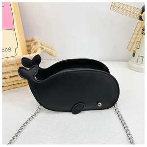 Detail of cute black dolphin shaped children's shoulder bag with metal chain and top zipper