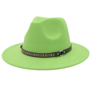 Detail of green fedora hat featuring ethnic geometric band and silver metal buckle