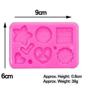 Moule en silicone rose avec 6 formes dont étoile et cœur pour chocolat et pâtisserie