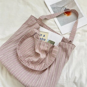 Detail of pink striped canvas tote bag with You are so Special embroidery text