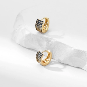Elegant gold hoop earrings featuring four rows of pave-set deep blue round zircons