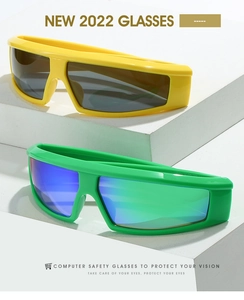 Detail of neon yellow and green Y2K sports sunglasses on minimalist display