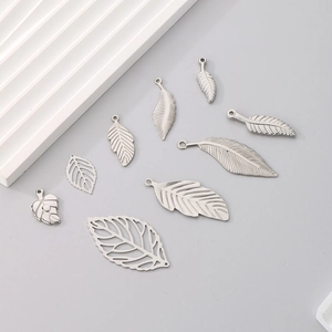 Eight unique silver leaf pendants for DIY jewelry making in polished stainless steel