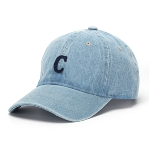 Close-up of washed blue denim baseball cap featuring vintage letter C embroidery detail