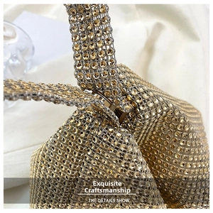 Macro shot of high-density golden rhinestones on a luxury evening clutch bag