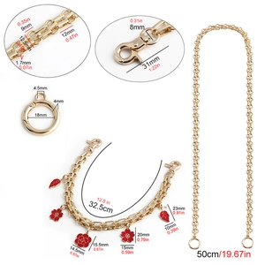 Detail of 50cm golden chain strap with red flower charms and technical size dimensions