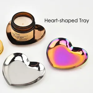 Heart-shaped stainless steel storage trays in silver, rainbow, and bronze mirror finishes