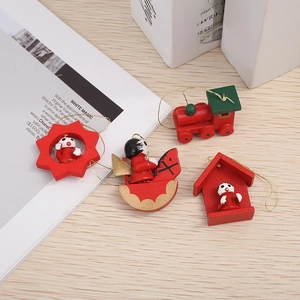 Detailed view of 4-piece set hand-painted wooden Christmas tree ornaments on wood