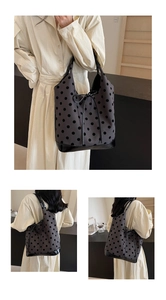 Detailed views of a dark grey polka dot canvas tote with premium leather base