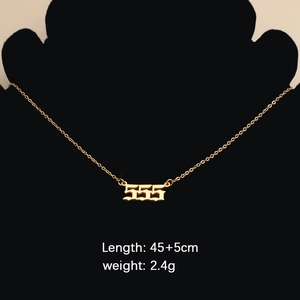 Detail of gold lucky number 555 necklace with dimensions 45+5cm and 2.4g weight