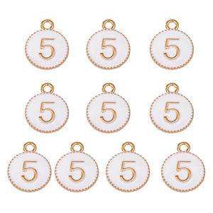 Flat lay of ten white enamel round pendants with gold number 5 for DIY jewelry