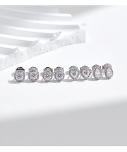 Macro shot of S925 sterling silver studs set with round, heart, square and drop stones