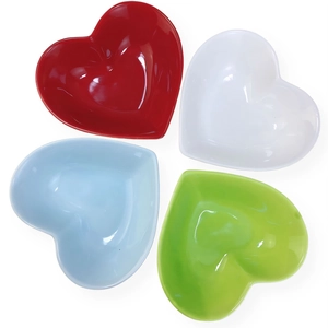 Set of heart-shaped ceramic bowls in red, white, blue, and green colors for desserts
