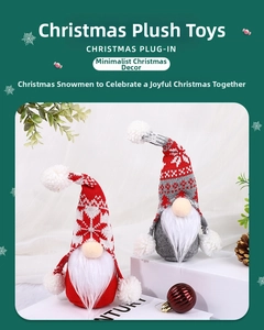 Detail of red and grey Christmas gnome dolls with knitted snowflake hats and plush beards