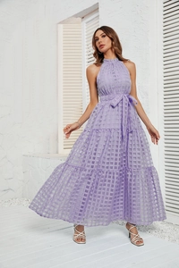 Detail of lavender halter dress showing checkered mesh texture and layered ruffle hem