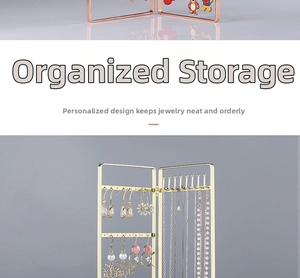 Detail of folding metal earring organizer screen with hooks and hanging holes in gold finish