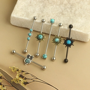 Industrial piercing bar set in stainless steel with turquoise and vintage metal charms