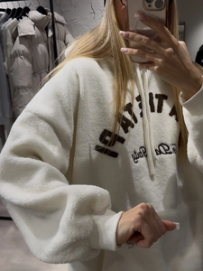 Women fleece pullover hoodie in cream white with premium embroidered letter detailing