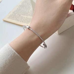 Detail of S925 silver bracelet with rectangular main stone and pave-set diamonds