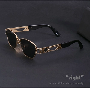 Detail of steampunk sunglasses with golden metal frame and CE certification marking