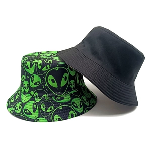 Reversible bucket hat for men and women with neon green alien print and solid black side