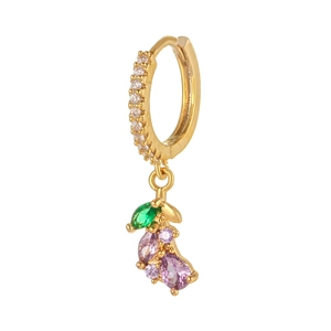 Detail of gold-plated vegetable earrings featuring emerald gems and white zircon inlay