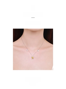 Detail of S925 silver necklace featuring a square yellow zircon and Leo zodiac charm