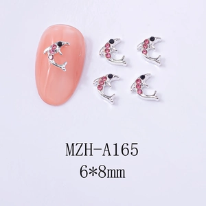 Detail of silver dolphin nail charms with pink rhinestones, dimensions 6x8mm