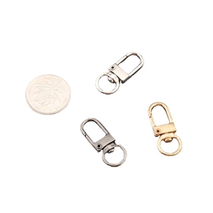 Zinc alloy lobster claw clasps in gold silver and black with coin for size reference