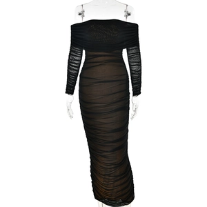Detail showing the sheer mesh ruched texture and off-shoulder design of this bodycon dress