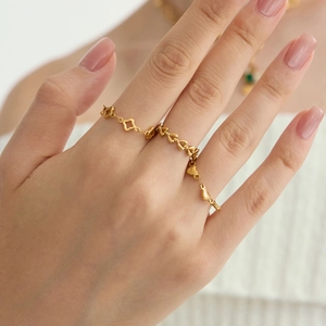 Retro 18K gold plated stainless steel chain ring with heart and clover hollow charms