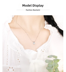 S925 sterling silver necklace with a 1-carat round zircon pendant worn by a model