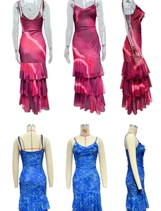 Detail view of backless bodycon maxi dresses with ruffled layers and spaghetti straps