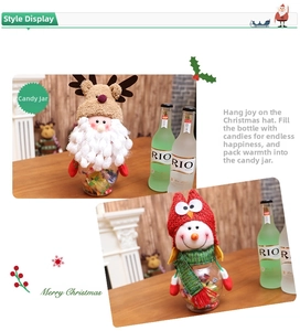 Detailed view of Christmas candy jars featuring plush Santa and snowman holiday characters
