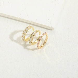 Three minimalist 14K gold plated zircon rings with pink and white rectangular stones