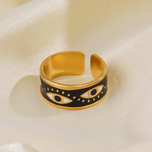 Bague vintage Œil du Mal dorée avec émail noir et design ouvert réglable bohème