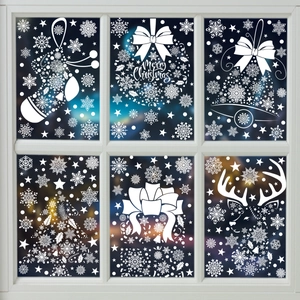 Stickers de Noël blancs pour fenêtres avec flocons et rennes sur fond bleu nocturne