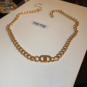 Elegant gold-tone Cuban chain necklace featuring a hollow CD logo pendant for women