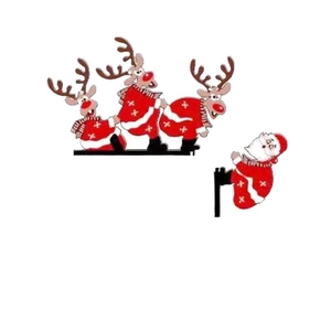 Christmas reindeer and Santa door frame corner decoration in festive red holiday outfits