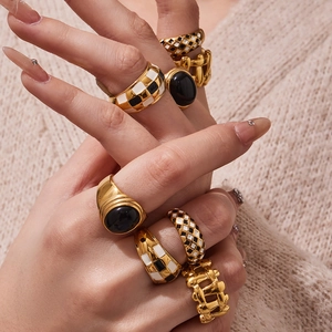 Retro 18k gold plated stainless steel rings featuring checkerboard enamel and black gemstone