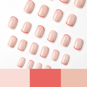 Short square press-on nails with nude pink base and thin red French tip design
