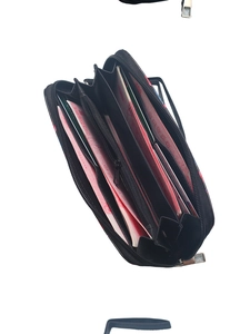 Internal view of long zipper wallet showing card slots and large cash compartments