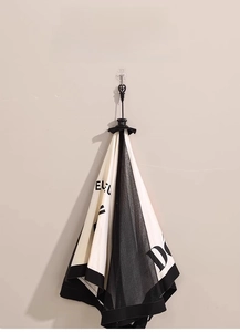 Foldable food cover net featuring black and white color-blocking and easy hanging strap