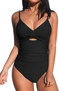 Detail of black one-piece swimsuit featuring elegant ruched texture and center cutout