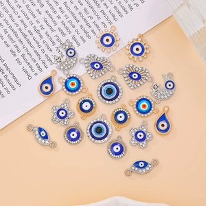 Assorted alloy evil eye charms in moon, sun, and heart shapes for DIY jewelry making