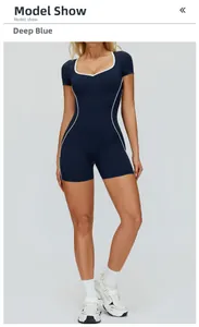 Close-up of contrast piping on a navy blue athletic bodysuit for fitness and yoga