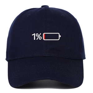 Close-up of 1% low battery embroidery on navy blue cotton baseball cap with fine texture