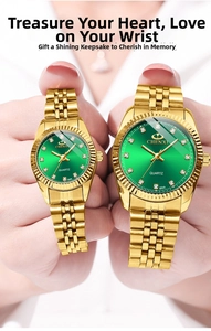 Detail of couple watches in gold steel with green dial and crystal markers