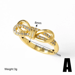 Detailed size view of bow heart ring with gold plating and cubic zirconia inlay