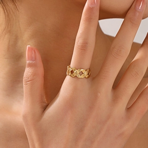 Adjustable gold stainless steel ring with elegant woven braided mesh design for women